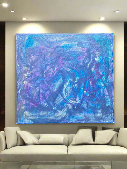 Abstract blue and purple painting on a wall above a white sofa.